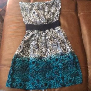 multi color strapless dress.